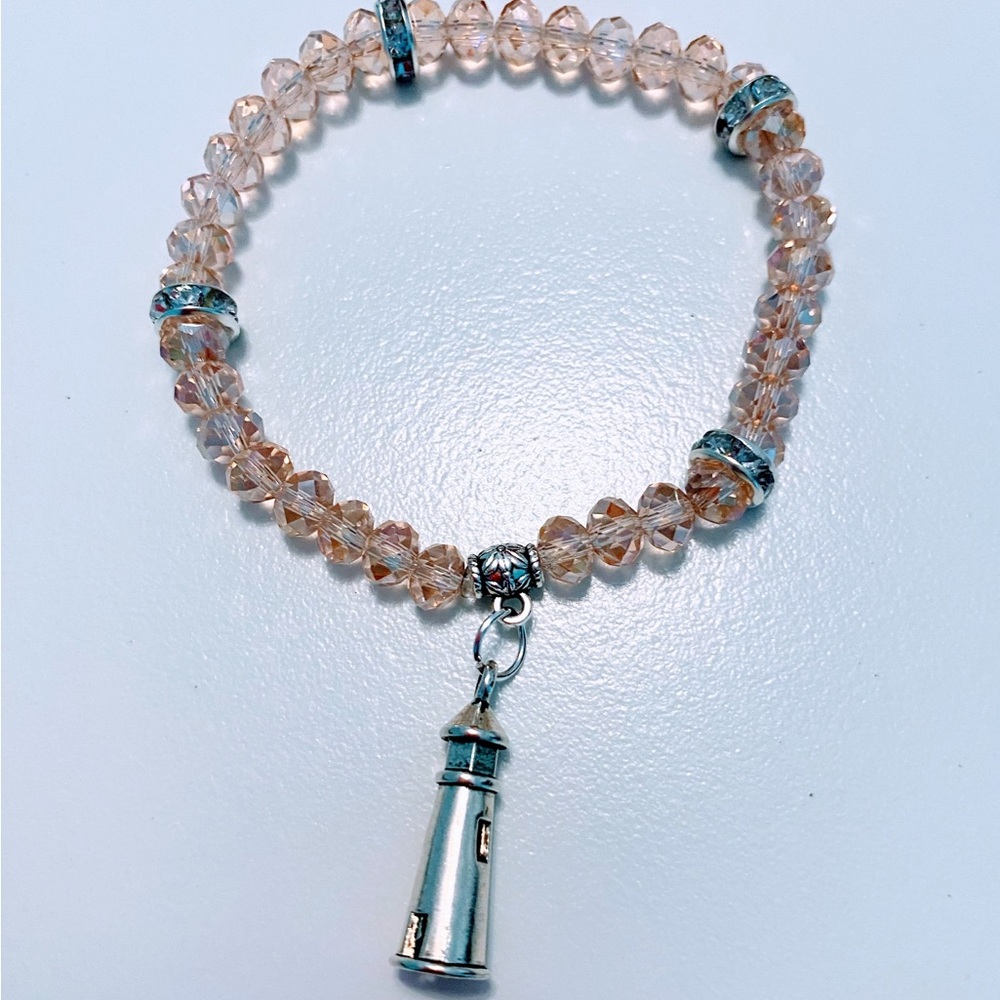 Elegant Pink Crystal Beaded Bracelet with Lighthouse Charm